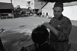 Bob Levis recycles old oil at Weldwood Mill, which is being nominated for GVRD environmental award.
