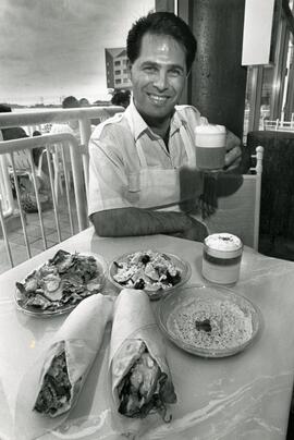 Chef with mediterranean food