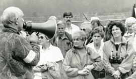 Mike Griffin, president of the Burke Mtn. Naturalists, addresses the crowd of about 120 prior to a Colony Farm Walkabout Sunday.