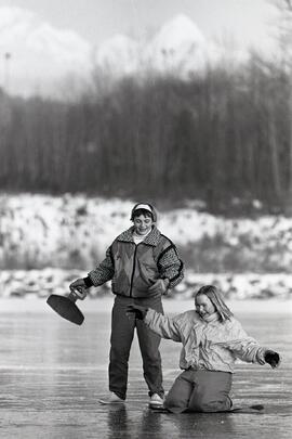 Kids sliding on ice at Lafarge Lake
